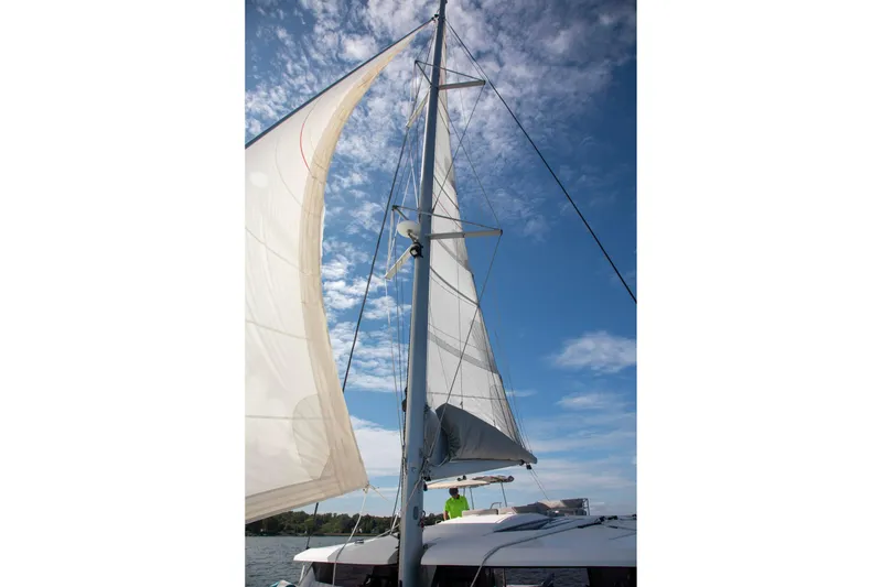 Slide: The Image of Sailing on a 2018 Fountaine Pajot Helia 44 Evolution under clear blue skies. - 5