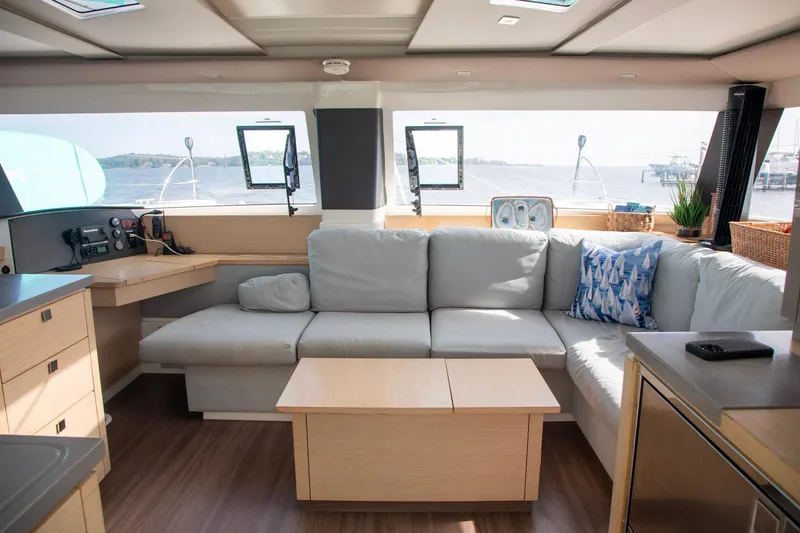 Slide: The Image of Interior of 2018 Fountaine Pajot Helia 44 Evolution catamaran with cozy seating and ocean view. - 54