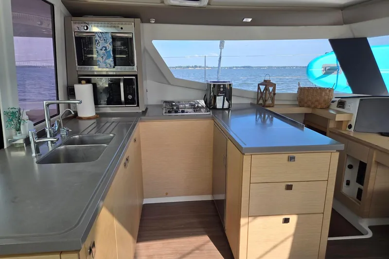 Slide: The Image of Modern kitchen interior of 2018 Fountaine Pajot Helia 44 Evolution catamaran with ocean view. - 57