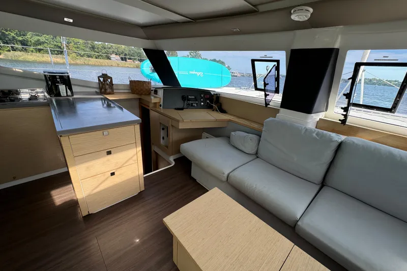 Slide: The Image of Interior of 2018 Fountaine Pajot Helia 44 Evolution catamaran with modern kitchen and seating area. - 59