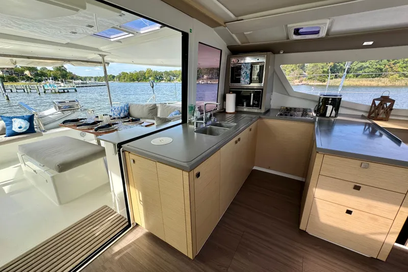 Slide: The Image of Modern kitchen and dining area on 2018 Fountaine Pajot Helia 44 Evolution yacht. - 60
