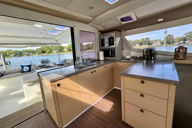 Slide: The Image of Modern kitchen interior of 2018 Fountaine Pajot Helia 44 Evolution catamaran with scenic water view. - 62