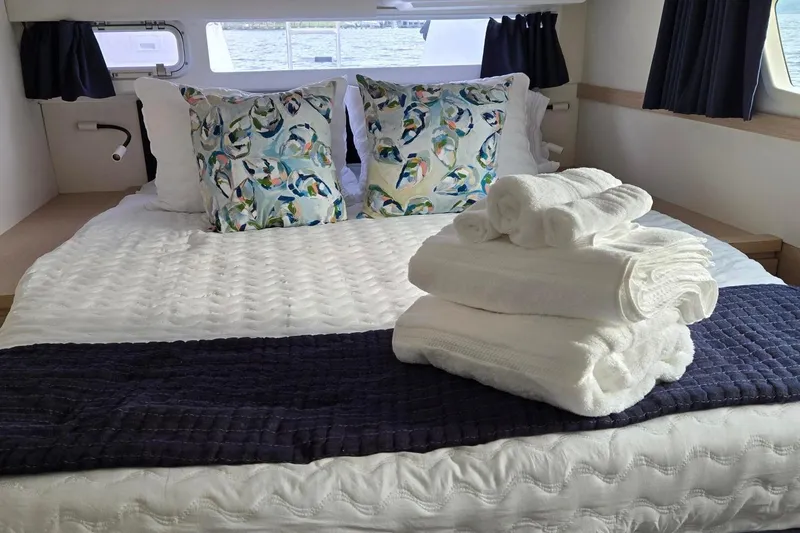 Slide: The Image of Luxurious cabin interior of 2018 Fountaine Pajot Helia 44 Evolution with cozy bedding. - 72