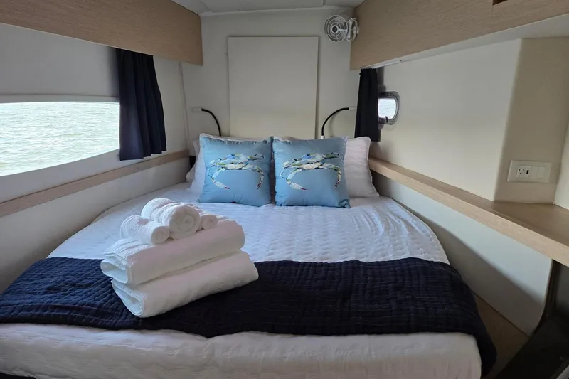 Slide: The Image of Cozy cabin interior of 2018 Fountaine Pajot Helia 44 Evolution with neatly arranged bed linens. - 74