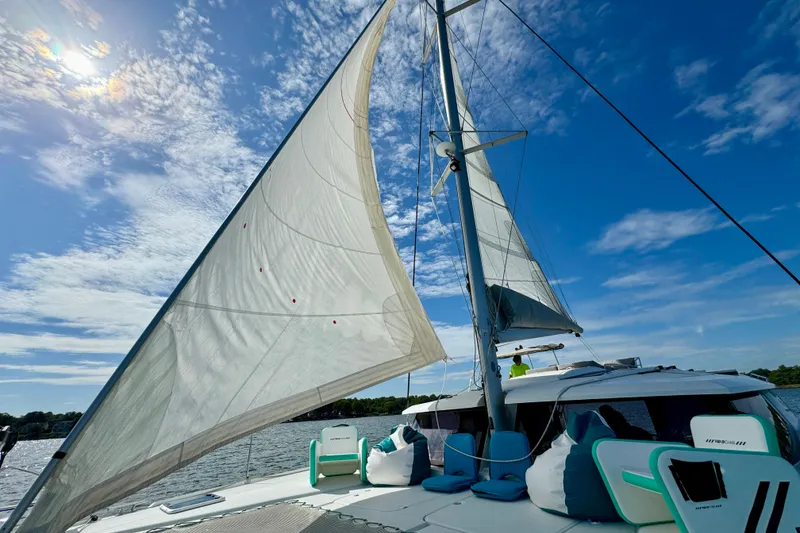 Slide: The Image of 2018 Fountaine Pajot Helia 44 Evolution sailing on a sunny day with clear skies. - 8