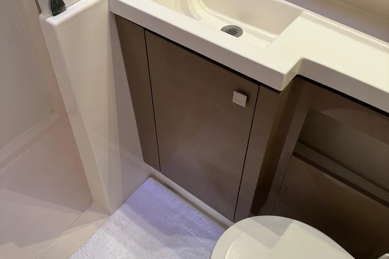 Slide: The Image of Bathroom interior of 2018 Fountaine Pajot Helia 44 Evolution yacht, featuring modern sink and cabinetry. - 88