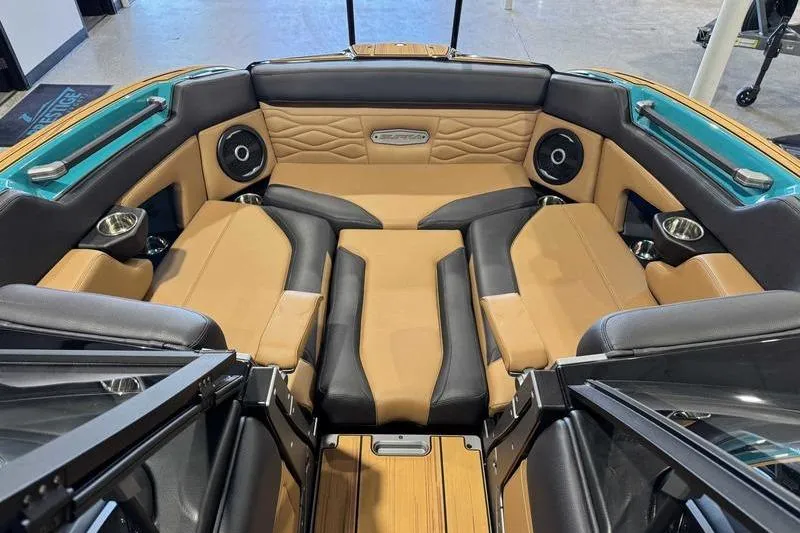 Slide: The Image of Luxurious interior of 2026 Supra SE boat with tan and black seating. - 10