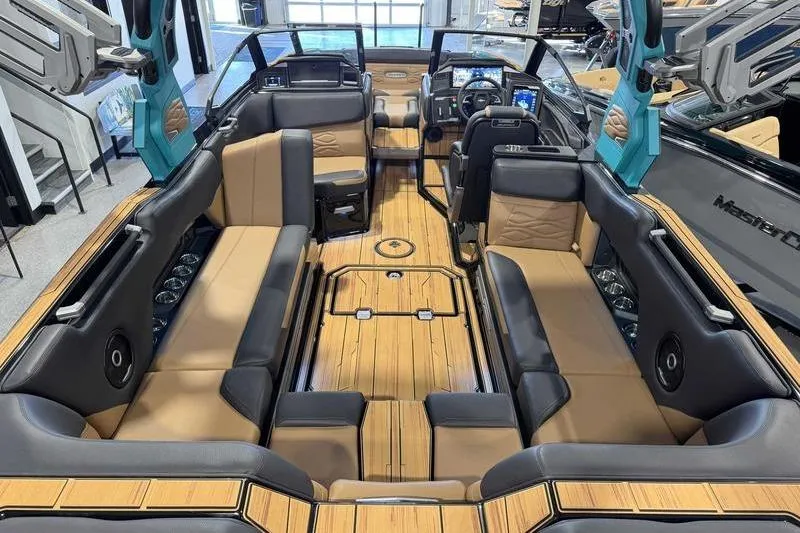 Slide: The Image of 2026 Supra SE boat interior with luxurious seating and modern dashboard design. - 12