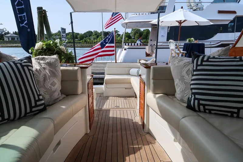 Slide: The Image of Luxurious interior of 2015 Hinckley Picnic Boat 37 MKIII with elegant seating and decor. - 33