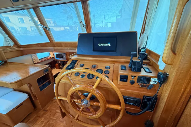 Slide: The Image of Helm of 2001 Grand Banks 46 Classic yacht with Garmin navigation system. - 22