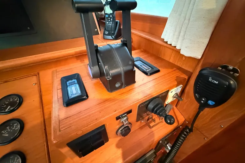 Slide: The Image of Control panel of a 2001 Grand Banks 46 Classic yacht with communication equipment. - 23