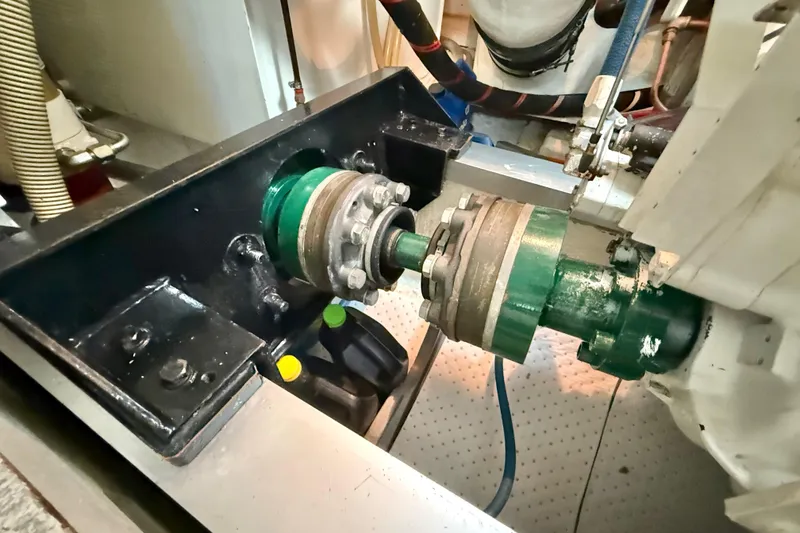 Slide: The Image of Engine room of 2001 Grand Banks 46 Classic yacht, showcasing mechanical components. - 85