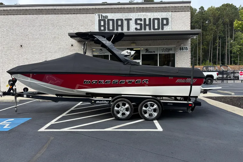 Slide: The Image of 2008 Malibu Wakesetter 23 LSV boat on trailer outside The Boat Shop. - 12