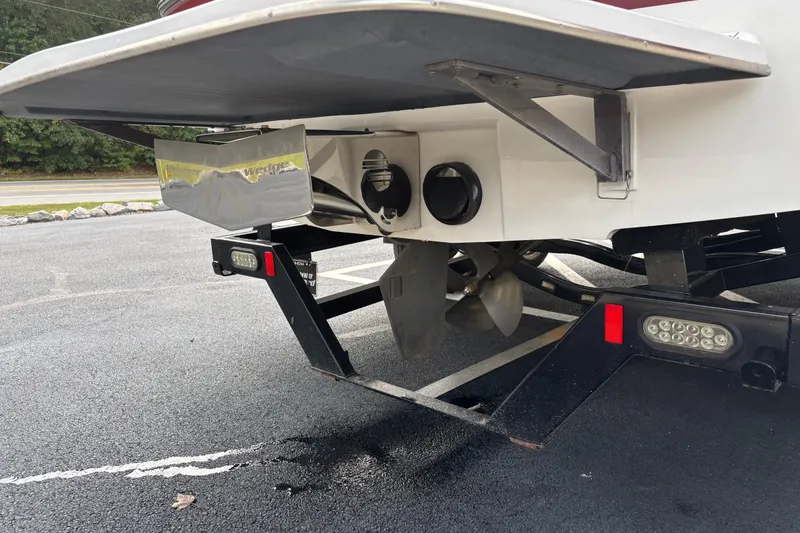 Slide: The Image of Rear view of a 2008 Malibu Wakesetter 23 LSV boat on a trailer. - 4