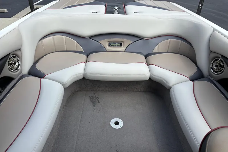 Slide: The Image of 2008 Malibu Wakesetter 23 LSV interior with plush seating and modern design. - 7