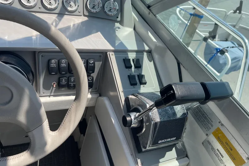 Slide: The Image of 1999 Formula 31 Performance Cruiser docked at marina, viewed from cockpit. - 23