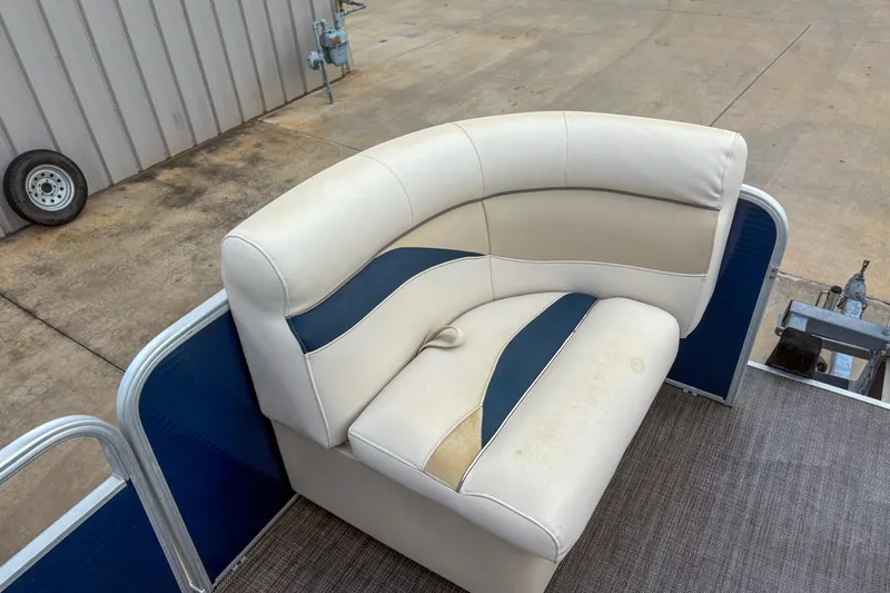 Slide: The Image of 2016 Godfrey Sweetwater 2086 C pontoon boat seat with blue and beige upholstery. - 12