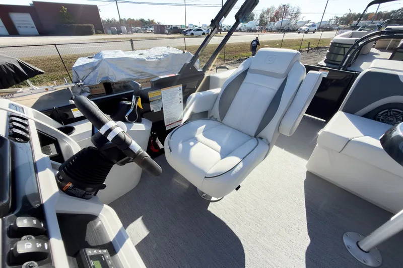 Slide: The Image of Captain's seat and helm of 2026 Godfrey Sweetwater 20' Cruise Special Edition Tritoon. - 11