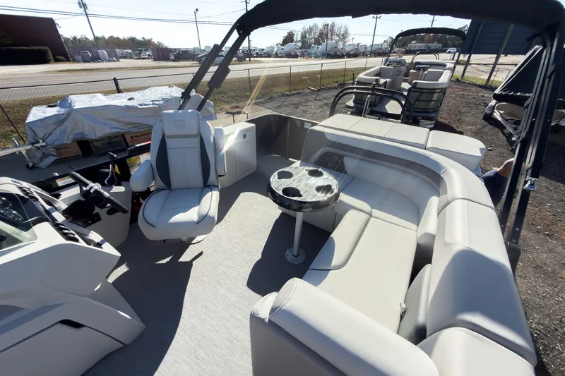 Slide: The Image of Interior of 2026 Godfrey Sweetwater 20' Cruise Special Edition Tritoon with seating and table. - 15