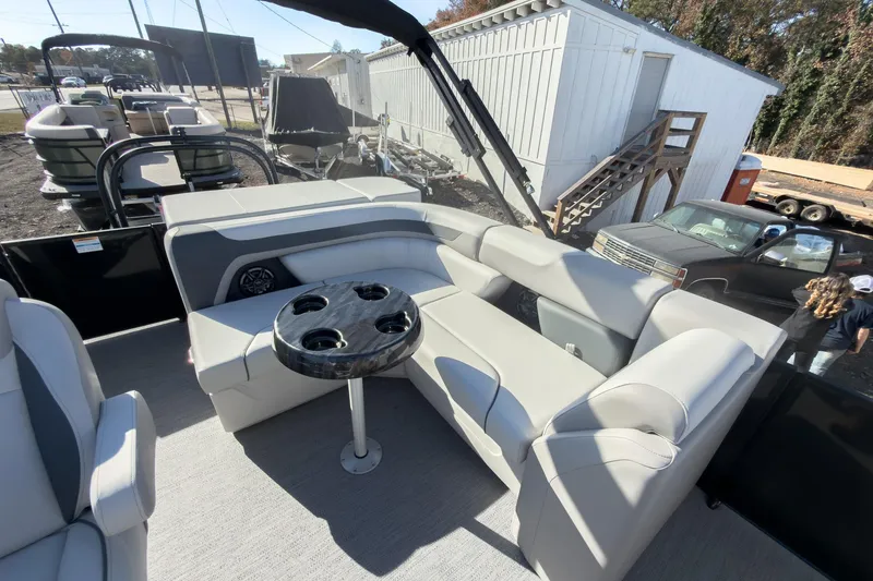 Slide: The Image of 2026 Godfrey Sweetwater 20' Cruise Special Edition Tritoon interior with plush seating and cupholders. - 16