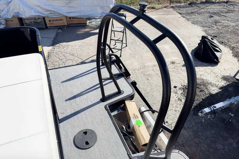 Slide: The Image of 2026 Godfrey Sweetwater 20' Cruise Special Edition Tritoon deck with ladder and storage compartment. - 21