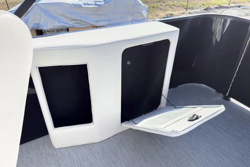Slide: The Image of Interior view of 2026 Godfrey Sweetwater 20' Cruise Special Edition Tritoon, featuring storage compartment. - 22