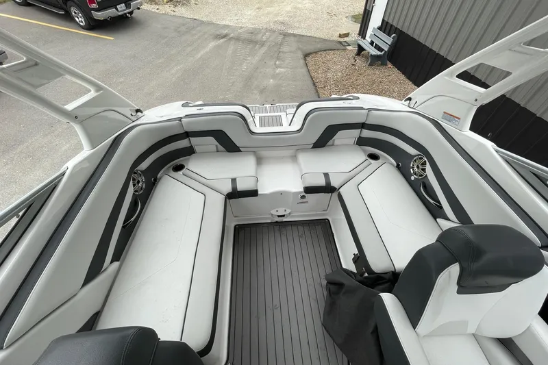 Slide: The Image of 2017 Yamaha 242 boat interior with sleek seating and modern design. - 8