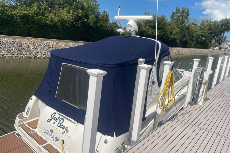 Slide: The Image of 2007 Sea Ray 320 Sundancer docked with blue cover, Catawba, Ohio. - 2