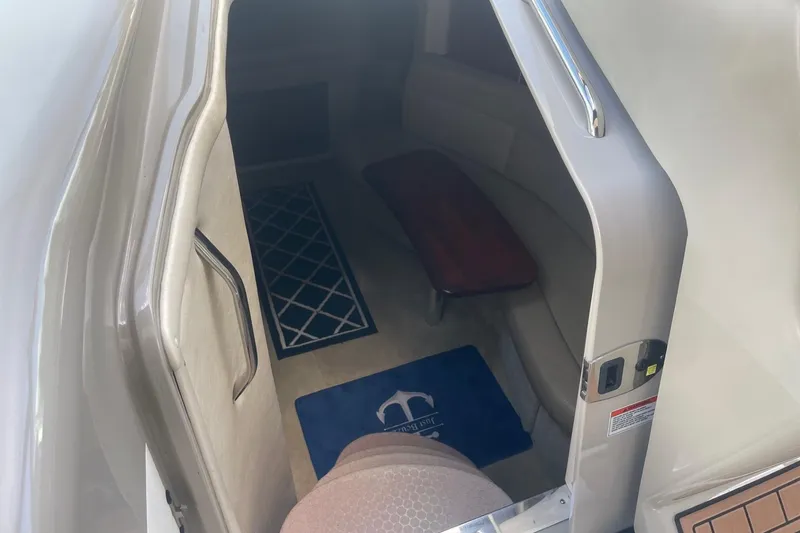 Slide: The Image of Interior view of 2007 Sea Ray 320 Sundancer cabin with seating and table. - 22