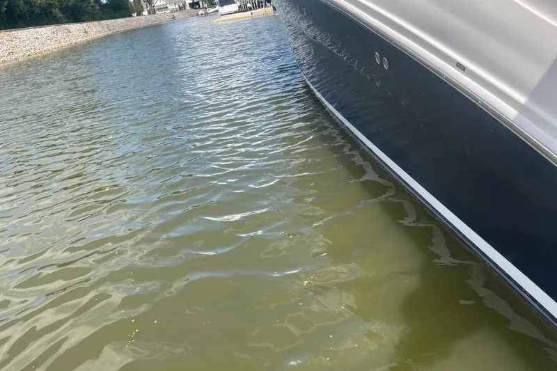 Slide: The Image of 2007 Sea Ray 320 Sundancer boat docked in calm waters. - 39