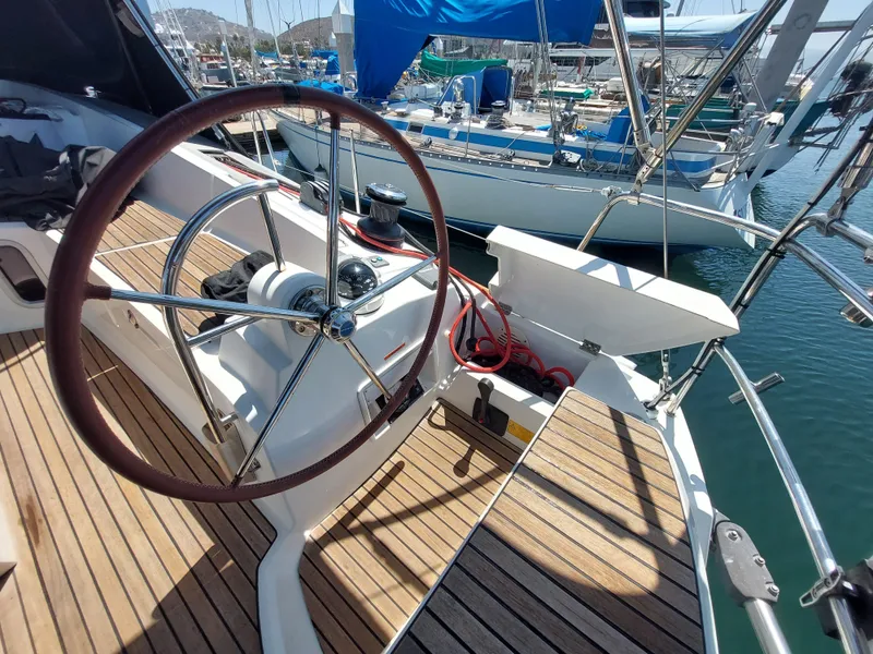 Slide: The Image of 2013 Jeanneau Sun Odyssey 44 DS sailboat deck with sleek design and modern fittings. - 15