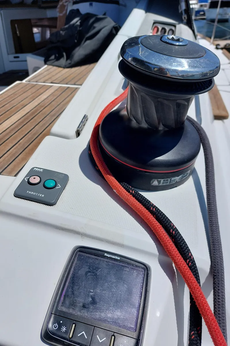 Slide: The Image of Cockpit of 2013 Jeanneau Sun Odyssey 44 DS with navigation equipment and teak flooring. - 20