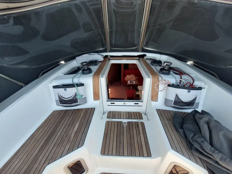 Slide: The Image of Jeanneau Sun Odyssey 44 DS 2013 sailboat deck with winch and control panel. - 25