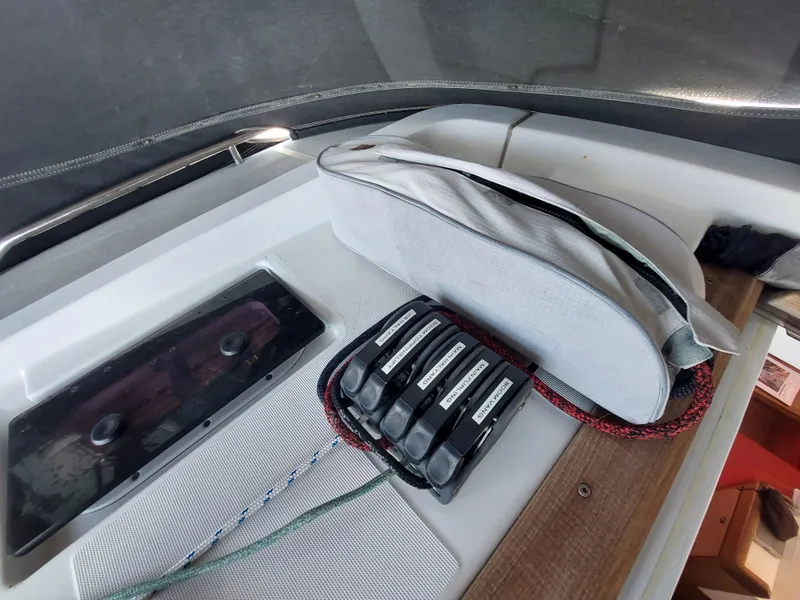 Slide: The Image of Storage compartment on a 2013 Jeanneau Sun Odyssey 44 DS, filled with ropes and sailing gear. - 26