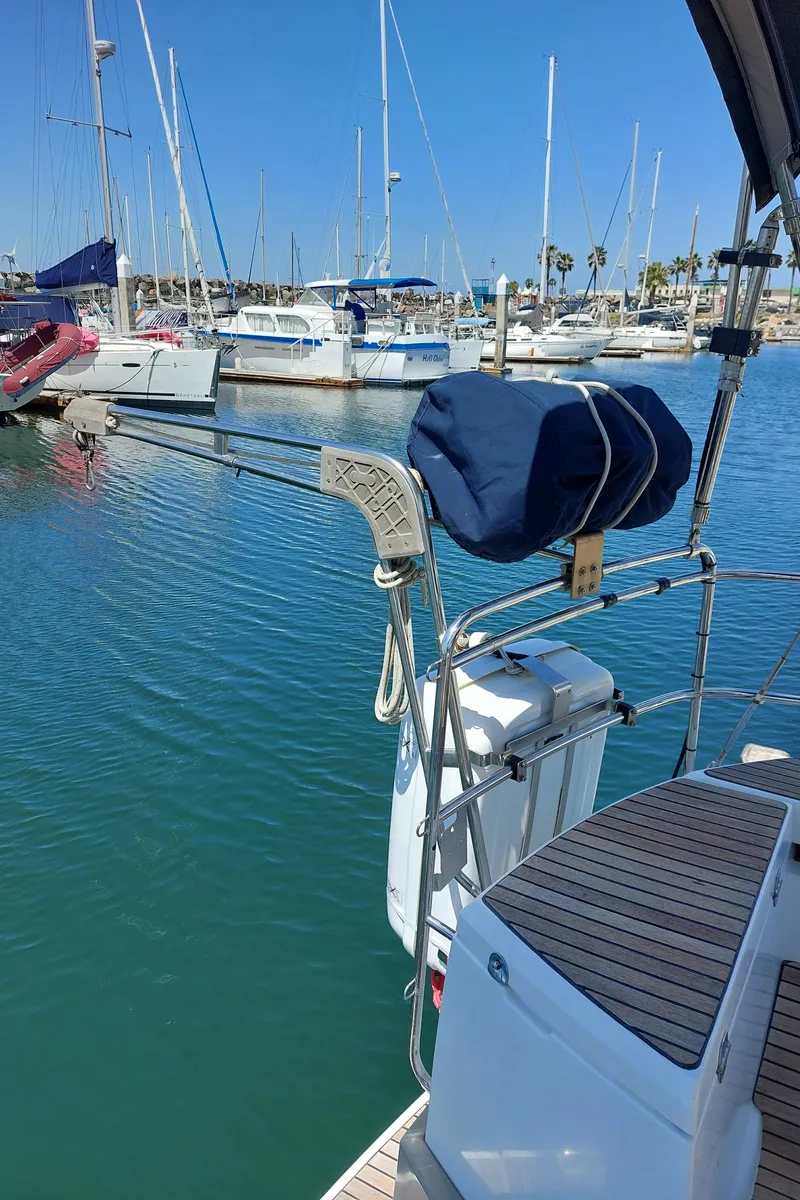 Slide: The Image of 2013 Jeanneau Sun Odyssey 44 DS sailboat deck with black canvas cover. - 34