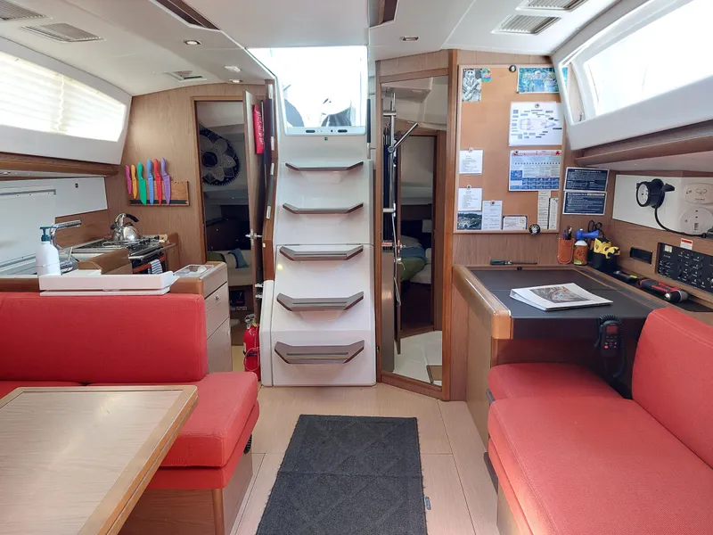 Slide: The Image of Jeanneau Sun Odyssey 44 DS sailboat deck, showcasing rigging and equipment, 2013 model. - 40