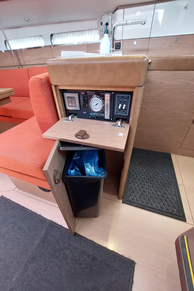 Slide: The Image of Interior of 2013 Jeanneau Sun Odyssey 44 DS yacht with modern kitchen and seating area. - 49