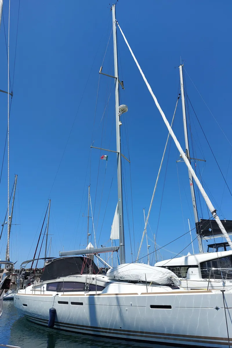 Slide: The Image of Jeanneau Sun Odyssey 44 DS yacht docked at marina, side view, 2013 model. - 5