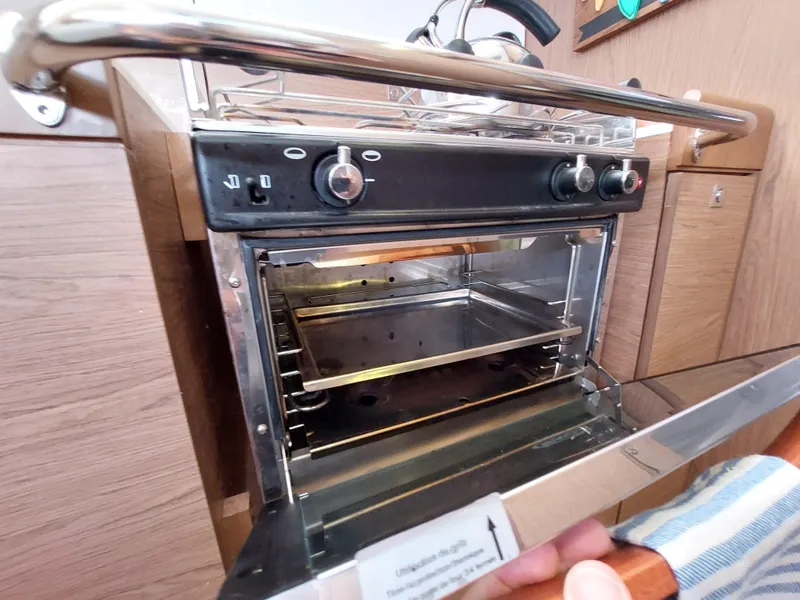 Slide: The Image of Interior storage under orange seating on 2013 Jeanneau Sun Odyssey 44 DS yacht. - 55