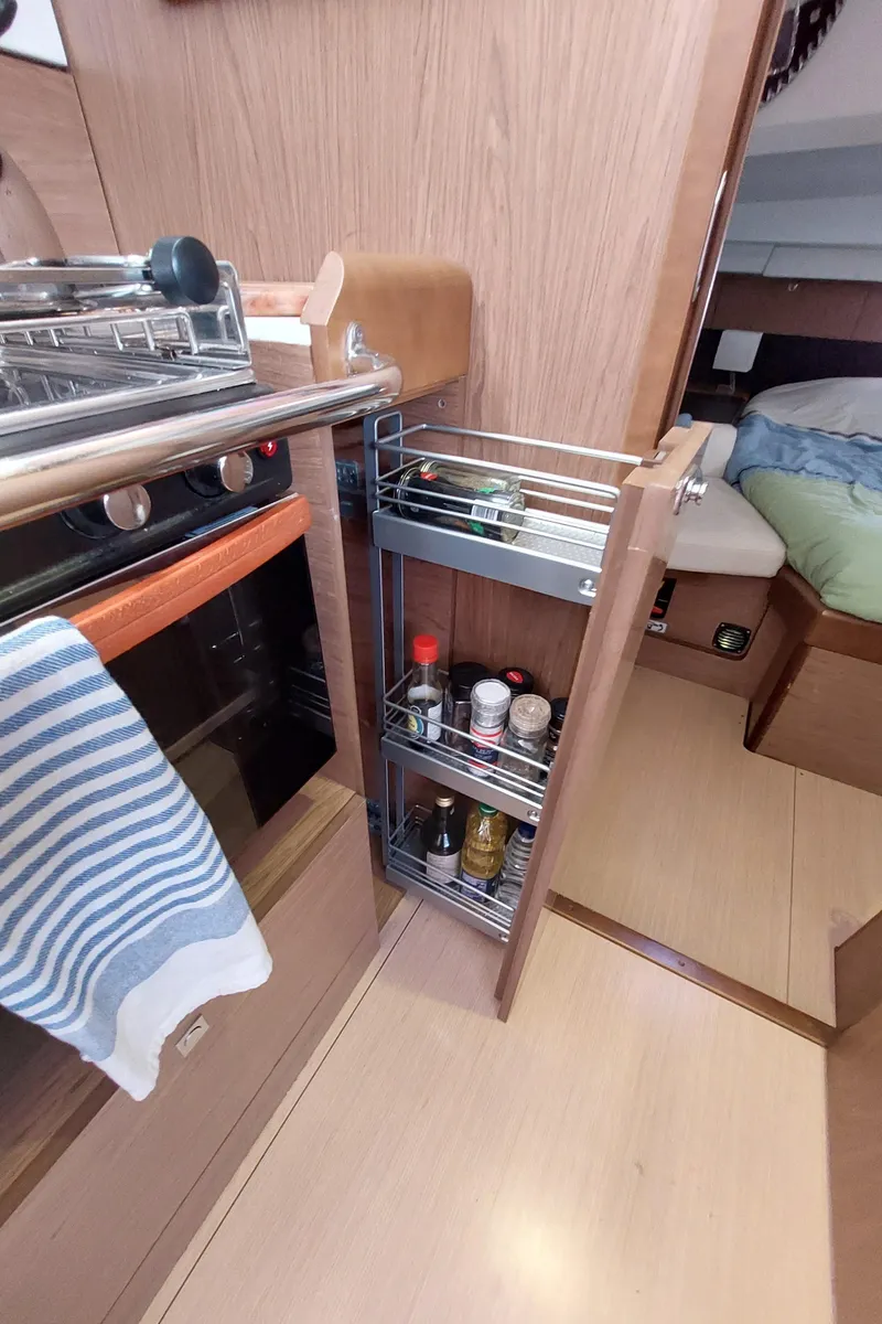 Slide: The Image of Control panel of 2013 Jeanneau Sun Odyssey 44 DS sailboat with navigation instruments. - 57