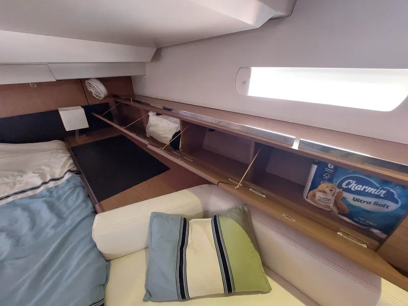 Slide: The Image of Control panel inside 2013 Jeanneau Sun Odyssey 44 DS yacht, featuring gauges and switches. - 64