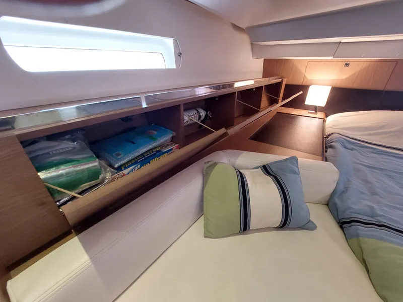 Slide: The Image of Galley kitchen in 2013 Jeanneau Sun Odyssey 44 DS yacht with stove and storage. - 66