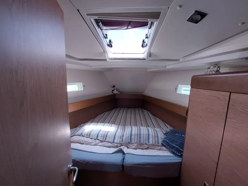 Slide: The Image of Galley kitchen in 2013 Jeanneau Sun Odyssey 44 DS sailboat with stove and storage. - 67