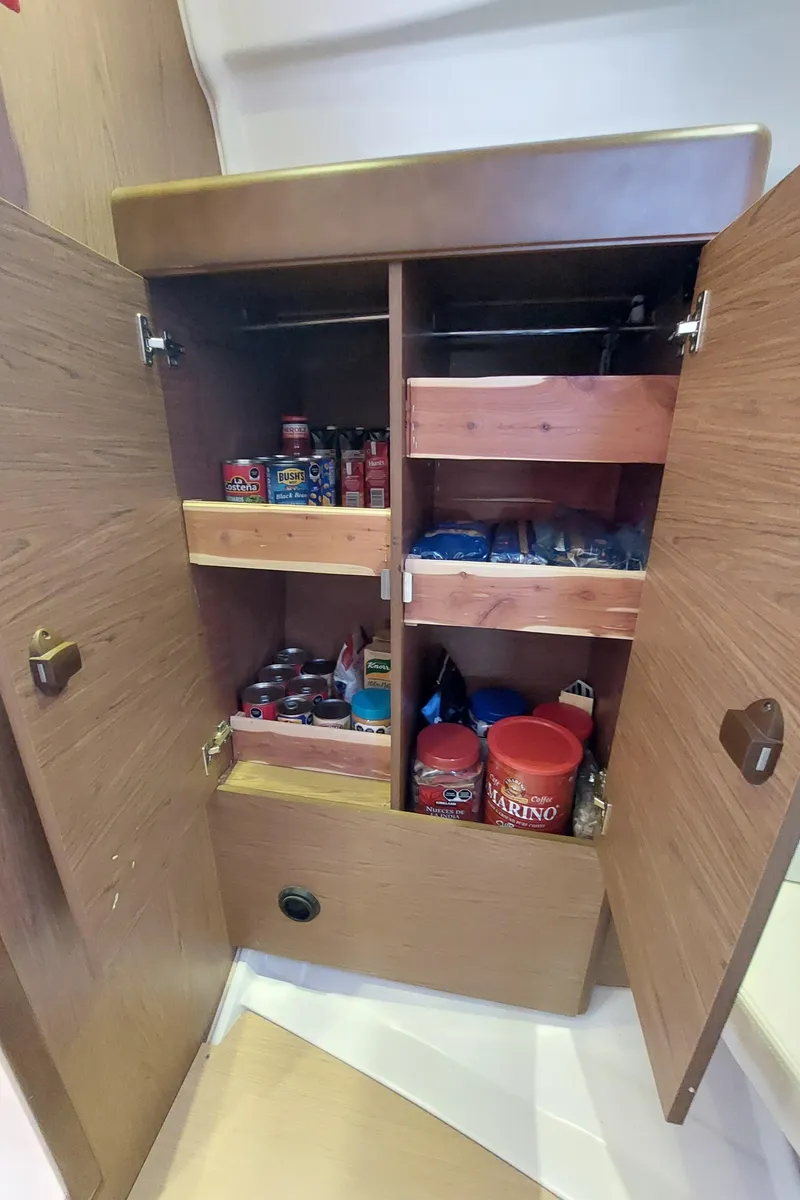 Slide: The Image of Sail of 2013 Jeanneau Sun Odyssey 44 DS against clear blue sky. - 99