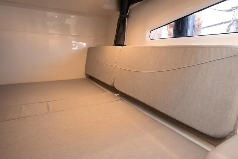 Slide: The Image of Interior cabin of 2026 Trophy T29 Explorer boat with cushioned seating. - 11