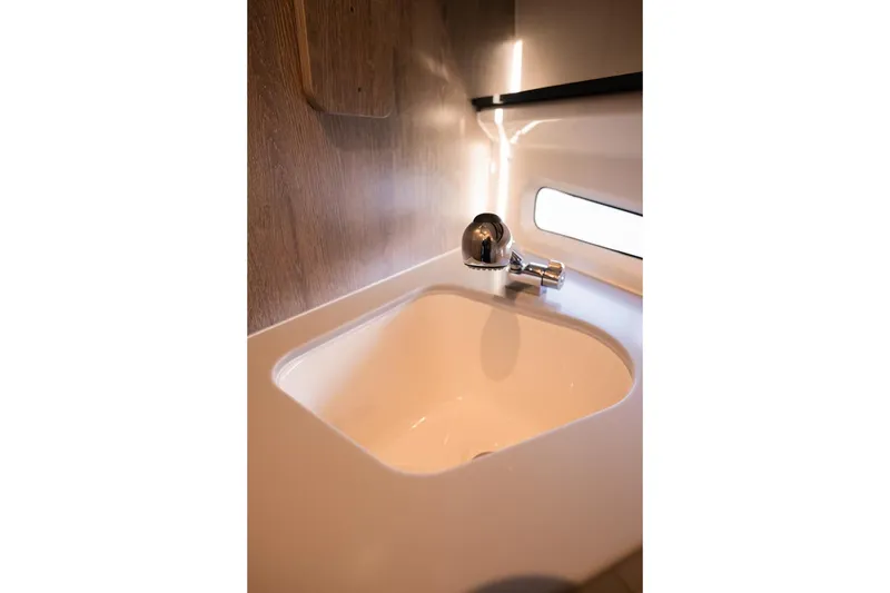 Slide: The Image of Modern sink in 2026 Trophy T29 Explorer boat interior. - 13