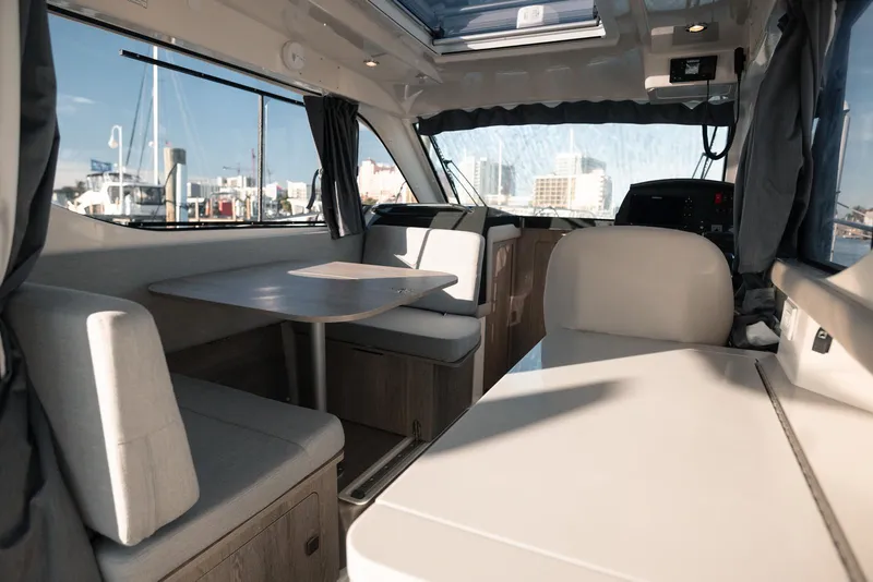 Slide: The Image of Interior of 2026 Trophy T29 Explorer boat with seating and table. - 15