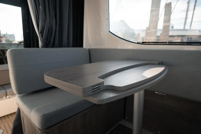 Slide: The Image of Modern interior of 2026 Trophy T29 Explorer with sleek table and seating. - 17