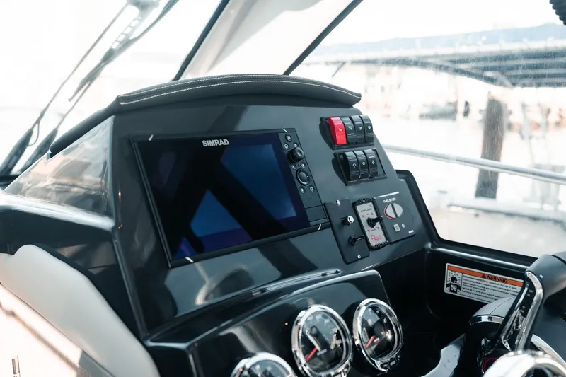 Slide: The Image of Control panel of 2026 Trophy T29 Explorer boat with Simrad display and gauges. - 23