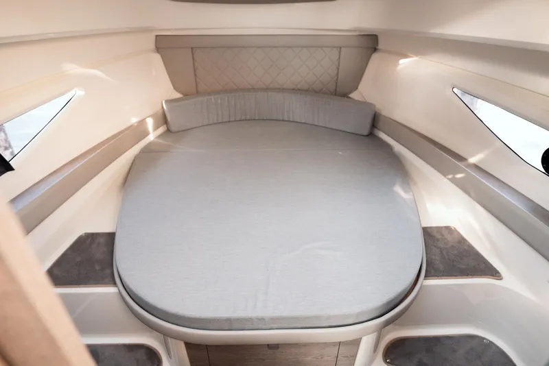 Slide: The Image of 2026 Trophy T29 Explorer cabin interior with cushioned bed and modern design. - 8